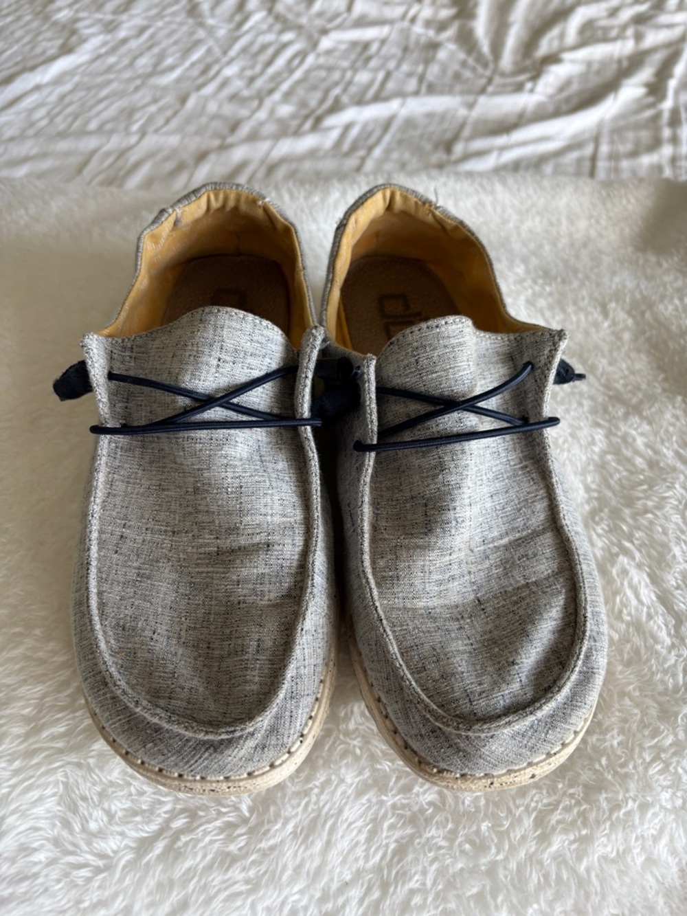 Casual blue and white women’s Hey Dude Slip-On Loafers with Navy Laces